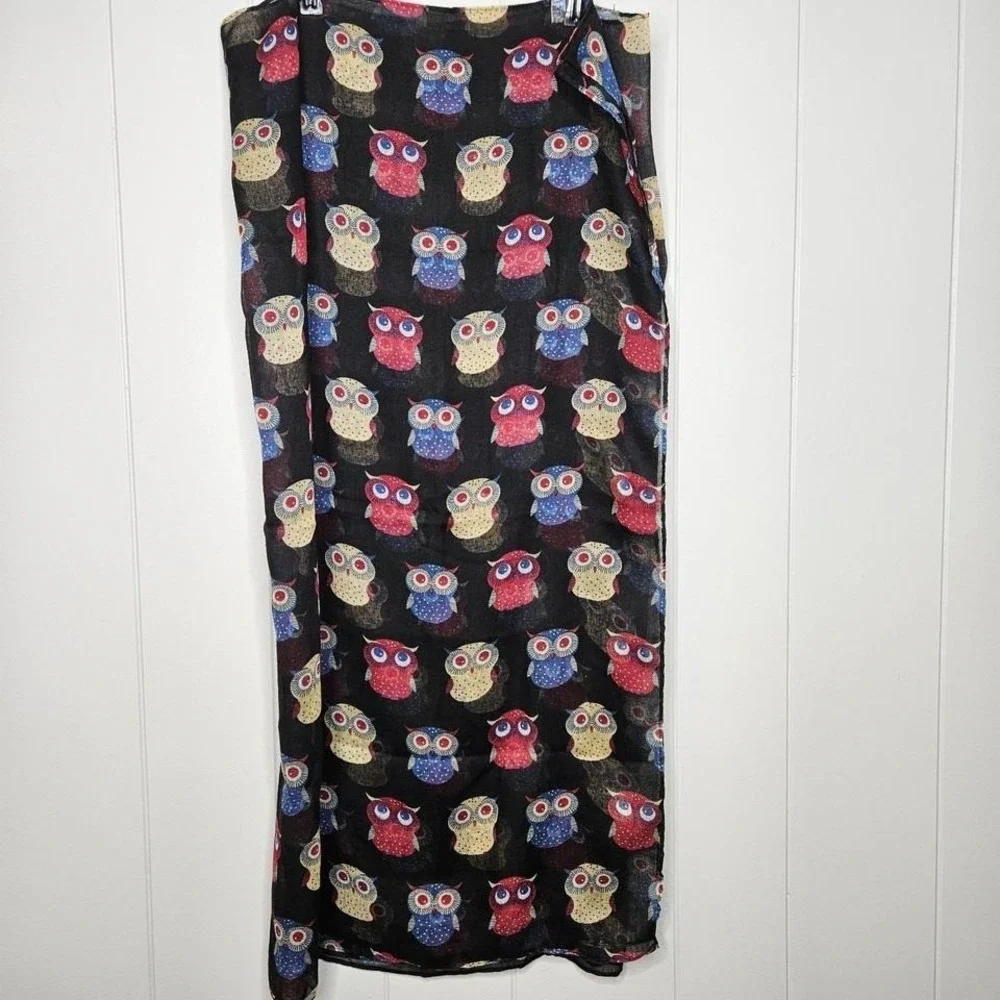 The Owls Scarf is a stylish and cozy accessory for‎ women